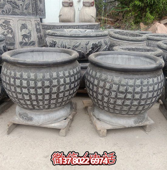 自然美學(xué)結(jié)合青石石雕、浮雕、編織、雕塑的戶外園林魚缸