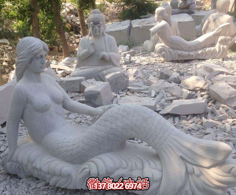 街道上擺放的漢白玉石雕創(chuàng)意美人魚(yú)雕塑